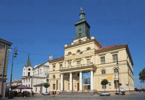 Classicist town hall with tower and columns under a blue sky, Town hall, Lublin, Poland, Europe