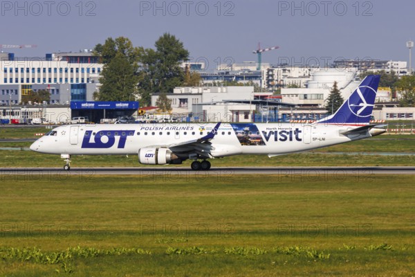 An Embraer 195 aircraft of LOT Polish Airlines with the registration SP-LNI and the Visit North