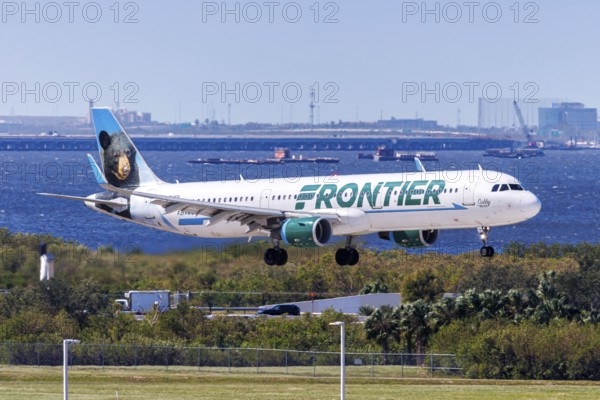 A Frontier Airlines Airbus A321 aircraft with the registration number N714FR at Tampa Airport, USA,