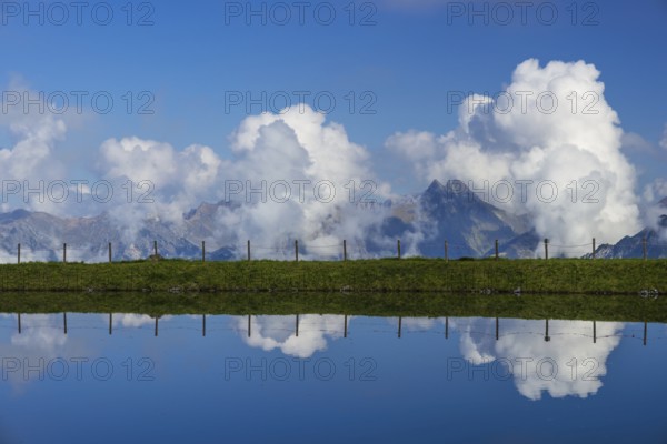Artificial lake, snow pond, at the mountain station of the Kanzelwand cable car, panoramic view of