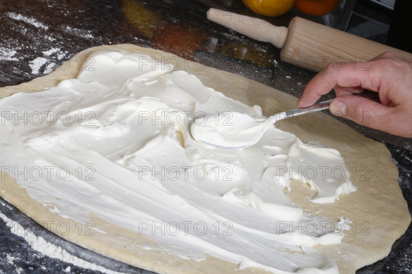 Swabian cuisine, preparation of savoury yeast plait with smoked meat, salty wreath bread, yeast