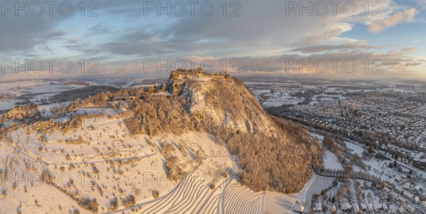 Aerial view, panorama of the snow-covered Hegau volcano Hohentwiel with Germany's largest castle