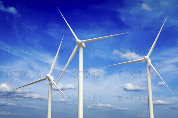 Green renewable energy concept, wind generator turbines in sky