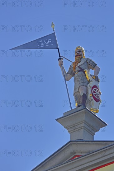 Roof figure of the guildhall, sculpture, warrior with lance and coat of arms with inscription GAF,