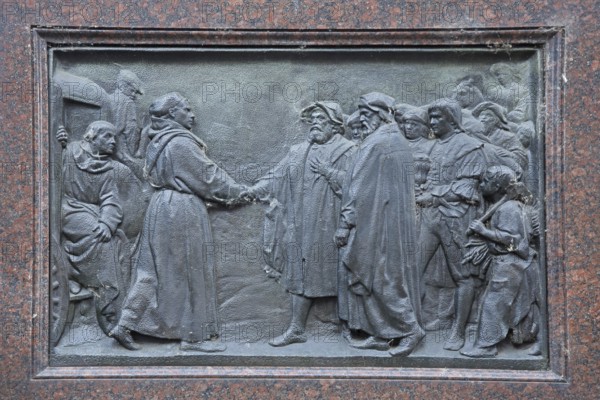 Relief with life story of Martin Luther, reception at the university in 1522, greeting, figures,