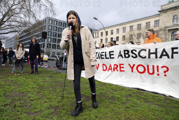 Luisa Neubauer speaks during a demonstration by Fridays for Future for compliance with climate