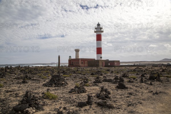 Red and white striped lighthouse, Faro de Toston, El Cotillo, Fuerteventura, Canary Islands, Spain,