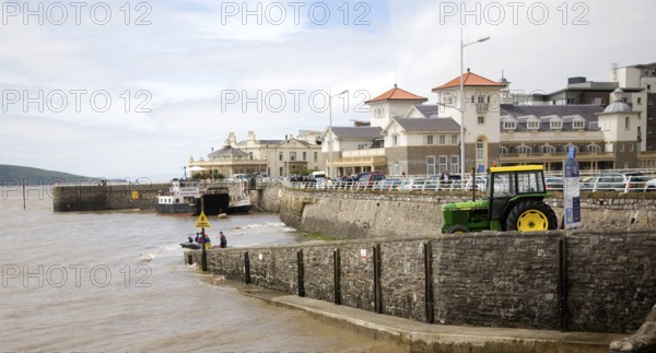Tractor on boat launch jetty, Knightstone Island, Weston Super Mare seafront, Somerset, England,