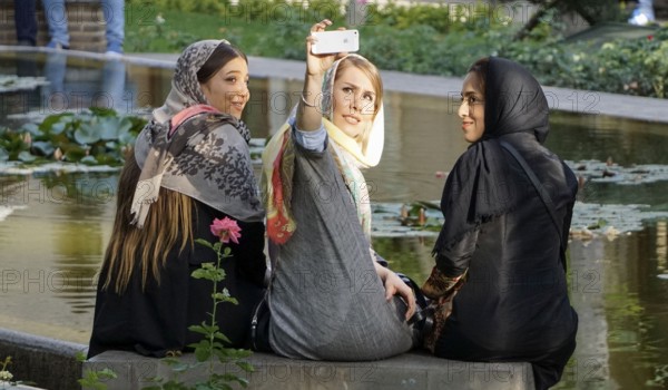 Three young Iranian woman take a selfie photo of themselves, Tehran, 22/05/2016