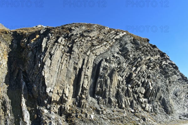 Folded rock layer, geological outcrop on the Furka Pass, Obergoms, Valais, Switzerland, Europe