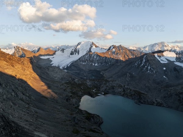Evening mood, mountain panorama, aerial view, 4000 metre peak with glacier, mountain pass and