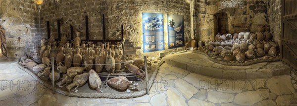 Panoramic photo of view of ancient amphorae from wreck recovered in Mediterranean Sea sunken sea