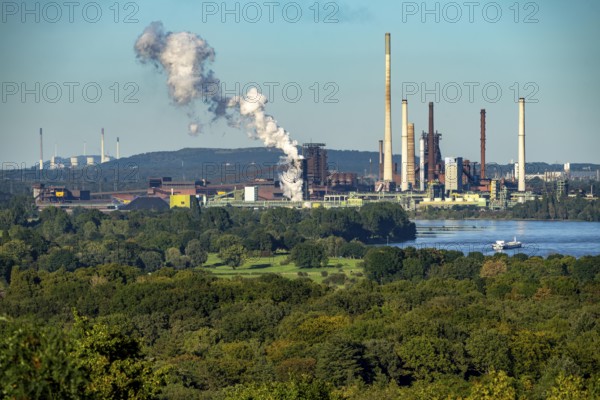 View across the Rhine to the Thyssenkrupp Steel steelworks in Duisburg-Beeckerwerth, blast