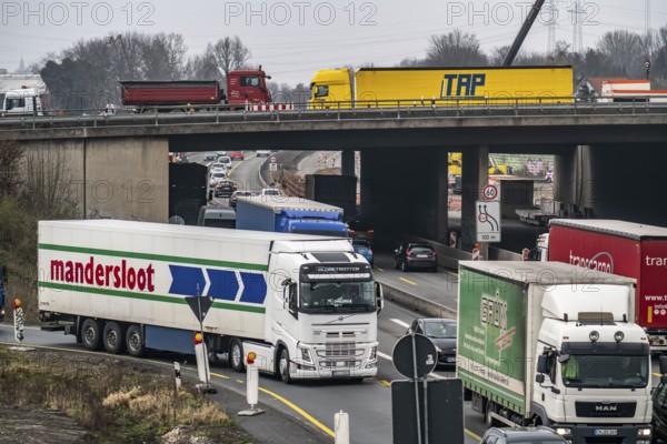 Heavy traffic at the Herne motorway junction, A42 and A43, major roadworks, many lorries, narrow,
