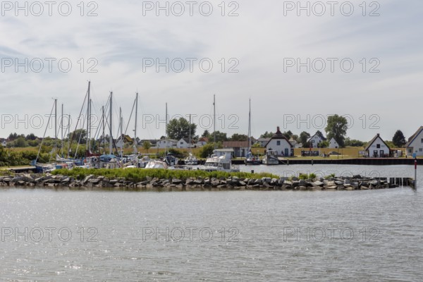 Idyllic little harbour with sailing boats and white houses in the background, Rügen, Hiddensee