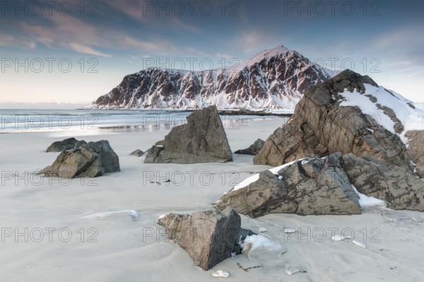 Winter evening mood at Skagsanden, stones on the beach near Flakstad, Flakstadøy, Lofoten,