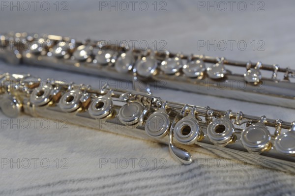 Close-up of the keys of a silver flute