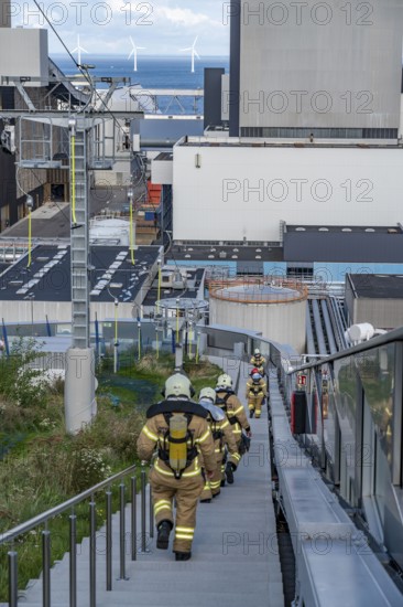 CopenHill, waste incineration plant and artificial ski slope, firefighters under respiratory