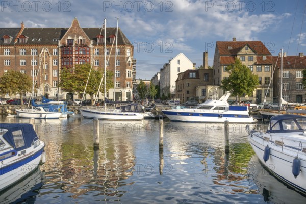 Sailboats and historic buildings, Christianshavn Canal, Copenhagen, Denmark, Europe