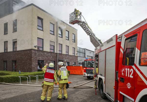 Duisburg, North Rhine-Westphalia, Germany, firefighting exercise, people are rescued from a burning