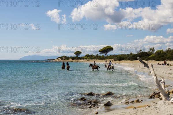 Lonely beach and riders, Spiaggia di Biderosa, Riserva Biderosa nature reserve, Orosei, Nuoro