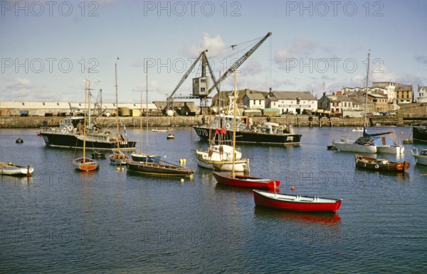 Boats in Portrush harbour, County Antrim, Northern Ireland, United Kingdom 1960s