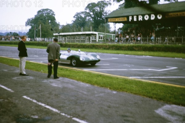 Blurred image of Bill de Selincourt, Whitsun sports car race on 3 June 1963, first place winner,
