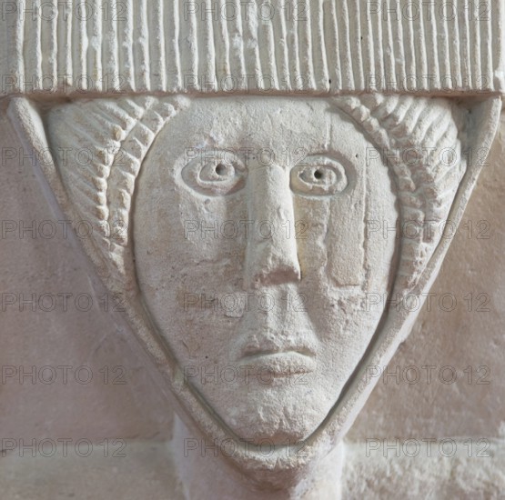 Stonework carved head of woman, church of Saint Michael, Yanworth, Gloucestershire, England, UK