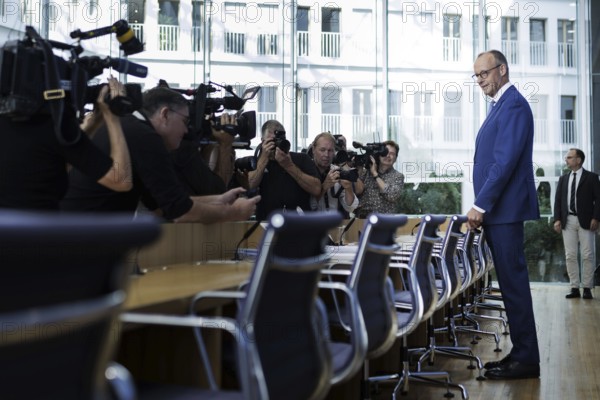 Friedrich Merz, CDU party chairman, at the Federal Press Conference on the consequences of Solingen