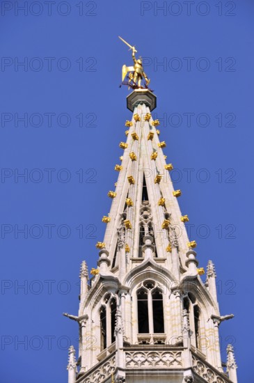 Gilded statue of the Archangel Michael fighting the dragon, the patron saint of the city of