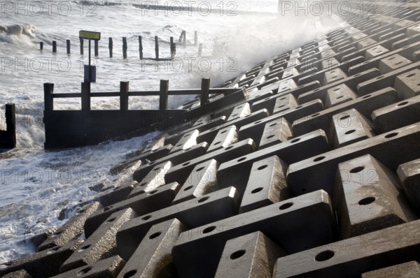 Wave swash hitting sea wall, Felixstowe, Suffolk, England, United Kingdom, Europe