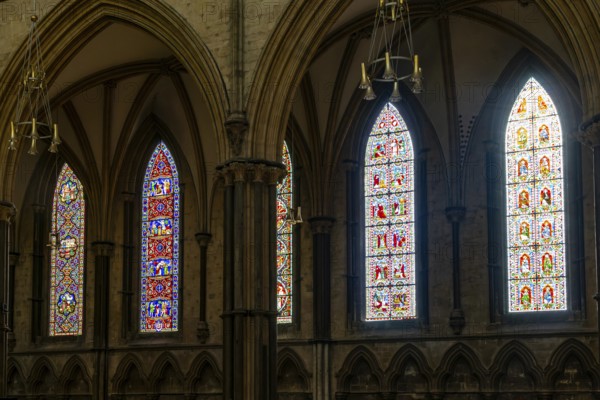 Stained glass windows on nave of cathedral church, Lincoln cathedral, city of Lincoln,