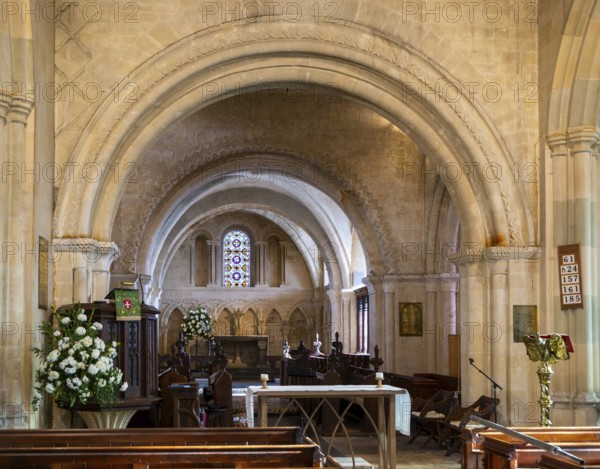 Norman chancel architecture inside church of Saint John the Baptist, Devizes, Wiltshire, England,