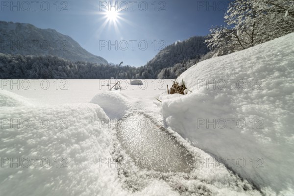 Freibergsee in winter, near Oberstdorf, behind it the Himmelschrofen, 1791m, and the Heini-Klopfer