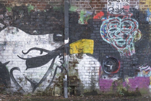Grafitti under the city railway bridge at Linderner harbour, lock, canal, reflection, Limmer,