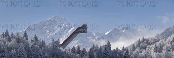 Mountain panorama over the Freibergsee in winter, near Oberstdorf, behind the Heini-Klopfer ski