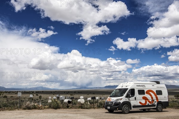 Letterboxes, mailboxes, cumulus clouds Highway 50, Loneliest Road in America, Ely, Nevada, USA,