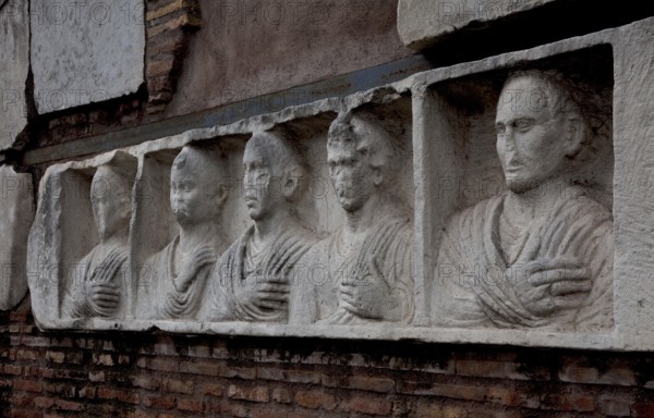 Ancient family tomb of Hilarius Fuscus, portrait reliefs