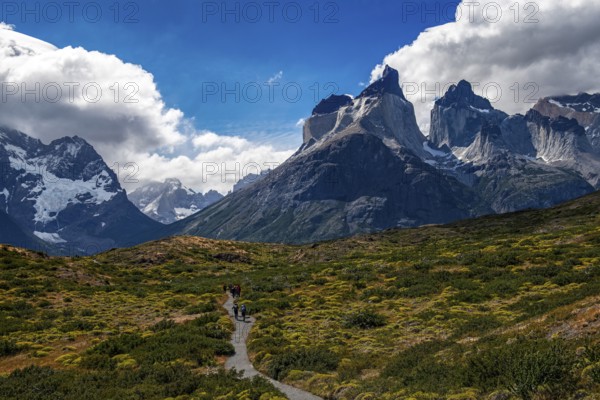 Trekker in front of the Cuernos del Paine, Torres del Paine National Park, Patagonia, Chile, South