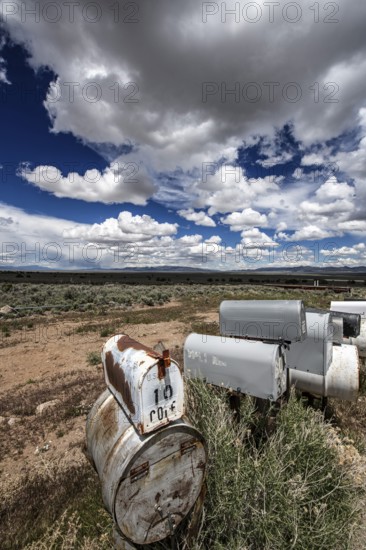Letterboxes, mailboxes, cumulus clouds Highway 50, Loneliest Road in America, Ely, Nevada, USA,