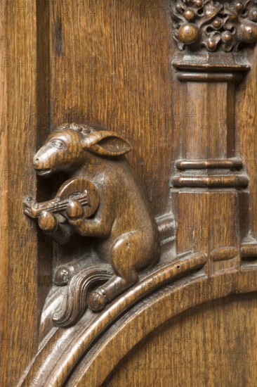 Choir stalls, drolleries on the stall sides with proverbial depictions, 1493 by Johannes Gruter