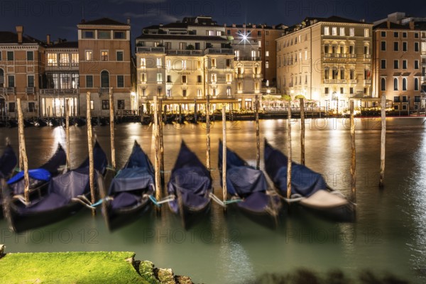 Venetian gondolas, boat dock at the customs office on the Grand Canal, Gondola Traghetto Dogana,