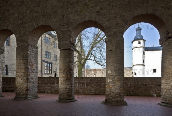 12th century, view through the northern row of pillars to Neuhaus Castle on the left and the stair