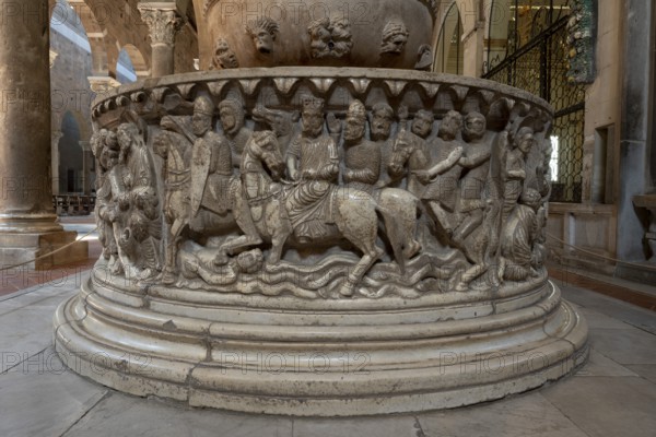 Lucca, San Frediano, north aisle, baptismal font, lower basin with scenes from the story of Moses: