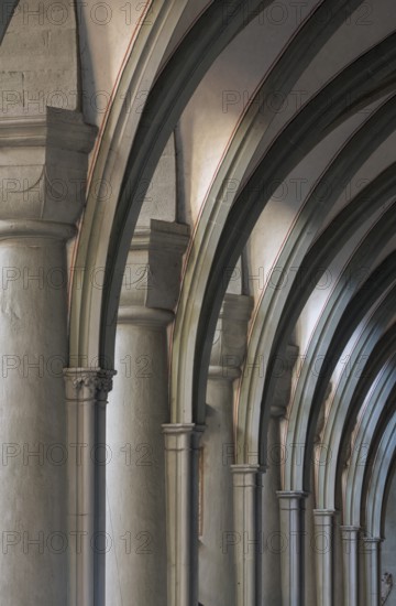 Constance, Minster, north aisle, Romanesque columns with Gothic vaulting