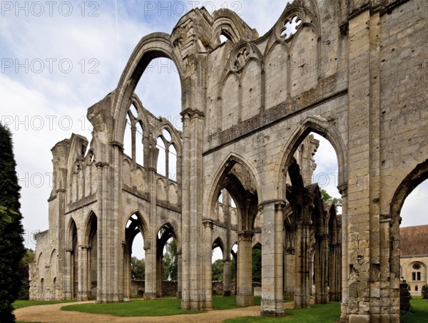 Cistercian abbey mid 13th century, church ruins, eastern transept wall and choir from south-west,