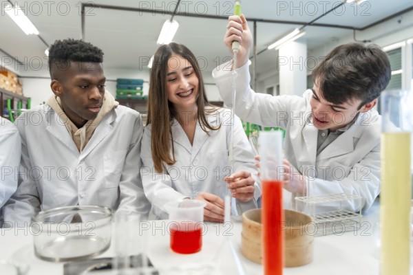 University students in lab coats conducting a chemistry experiment, using lab equipment and