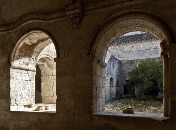 Cistercian monastery founded in 1144, church built 1175-1220, view through two cloister arcades