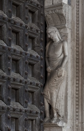 Italy Lodi 89769 Cathedral S Bassiano West portal right vault Sculpture of Adam around 1185
