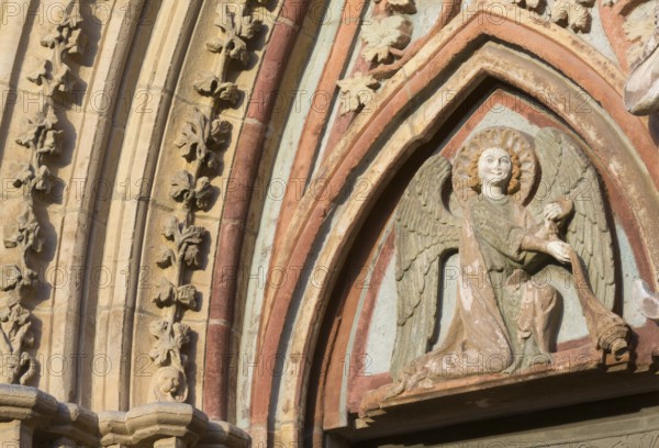 West portal, tympanum with angel, St., Sankt, Saint